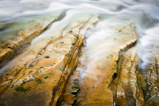 Water Flows over Rocks at Johnston Creek, Banff, AB